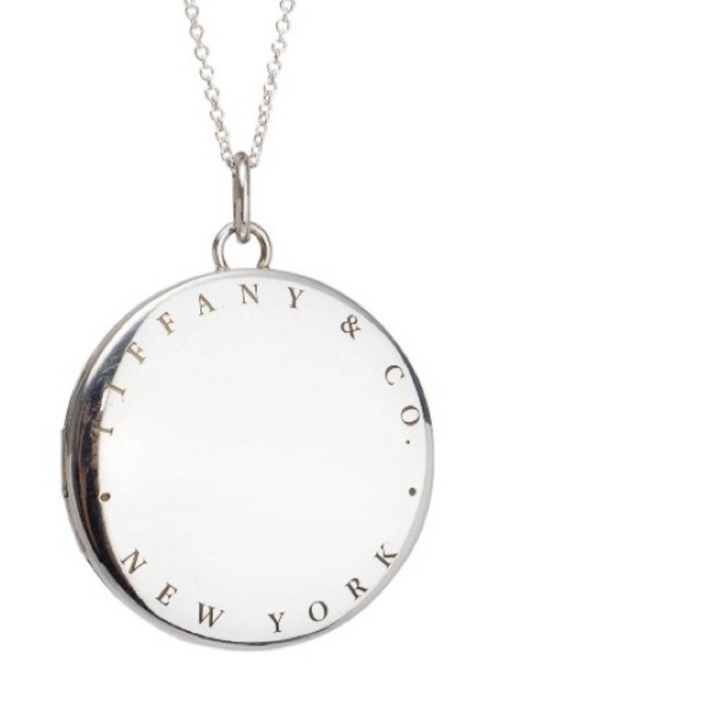Tiffany and co sterling silver locket on 22 inch chain like new never worn